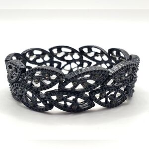 Elegant Black and Silver Bracelet with Intricate Metalwork